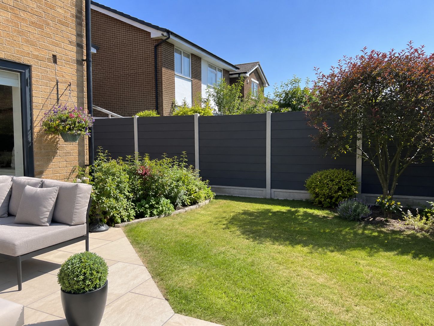 Composite fence panels installed in a Ealing back garden