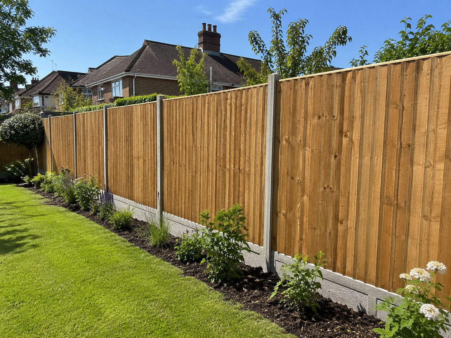 Closeboard fence with concrete posts in a Wimbledon back garden
