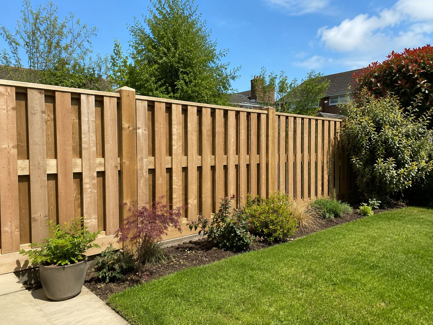 Hit-and-miss timber fence on a Sevenoaks countryside boundary